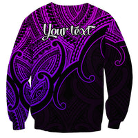 Purple and black unisex sweatshirt with dense tribal pattern and large dark feather-like motif