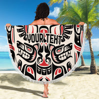 Round beach blanket with fringed edge, black white red tribal face and raven graphic