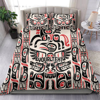 Duvet cover and two pillows showing black, white, and red tribal face pattern