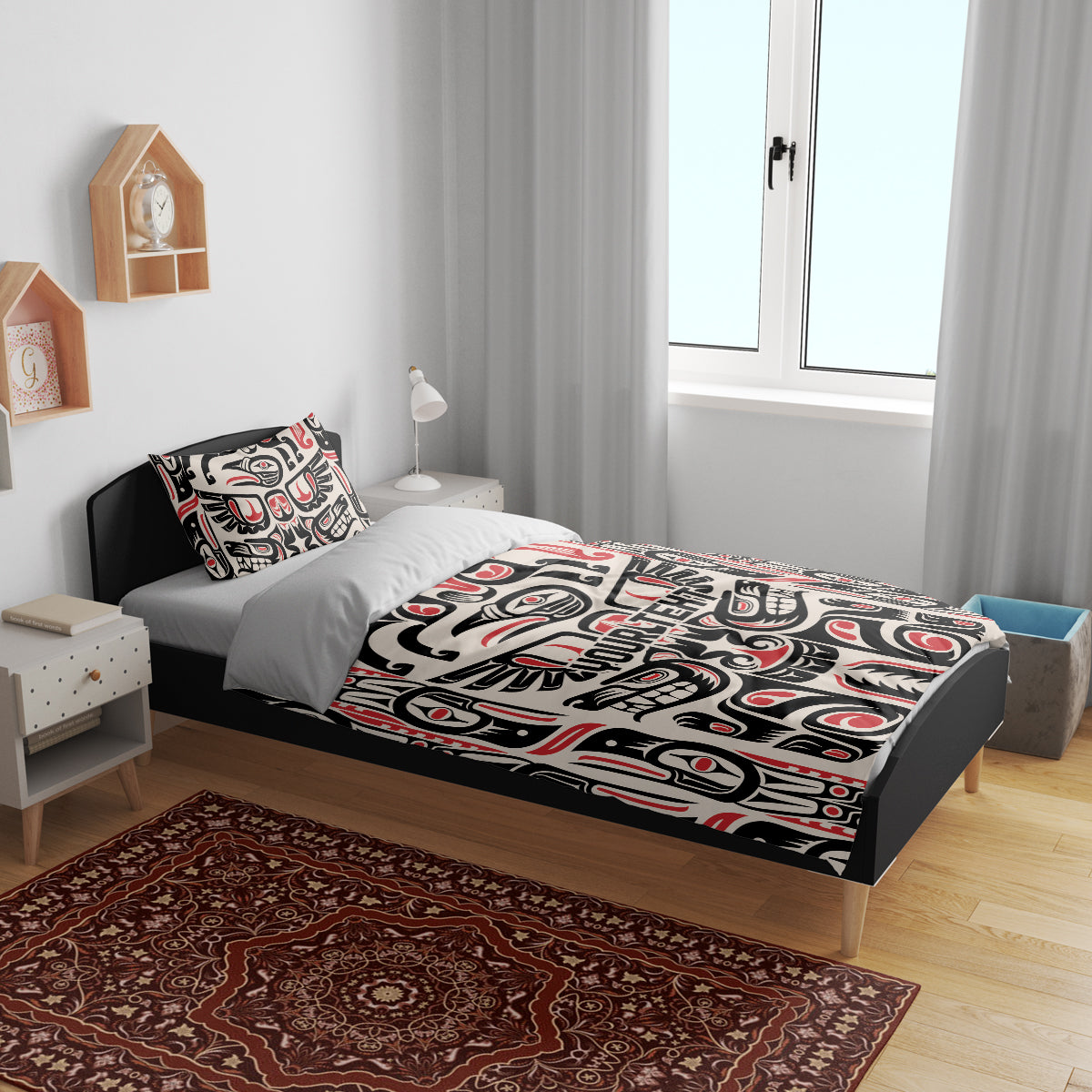 Bedding set with black, white, and red tribal pattern duvet and matching pillows
