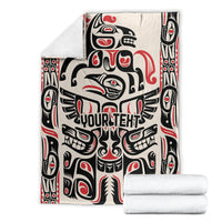 Haida-style blanket with centered 'YOUR TEXT' and red/black/white pattern, folded