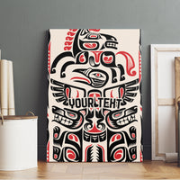 Wood-framed canvas wall art featuring bold black and red Haida-style totem face design.