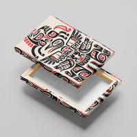 Wood-framed canvas wall art shown at angle, front black, white, and red Haida motif.