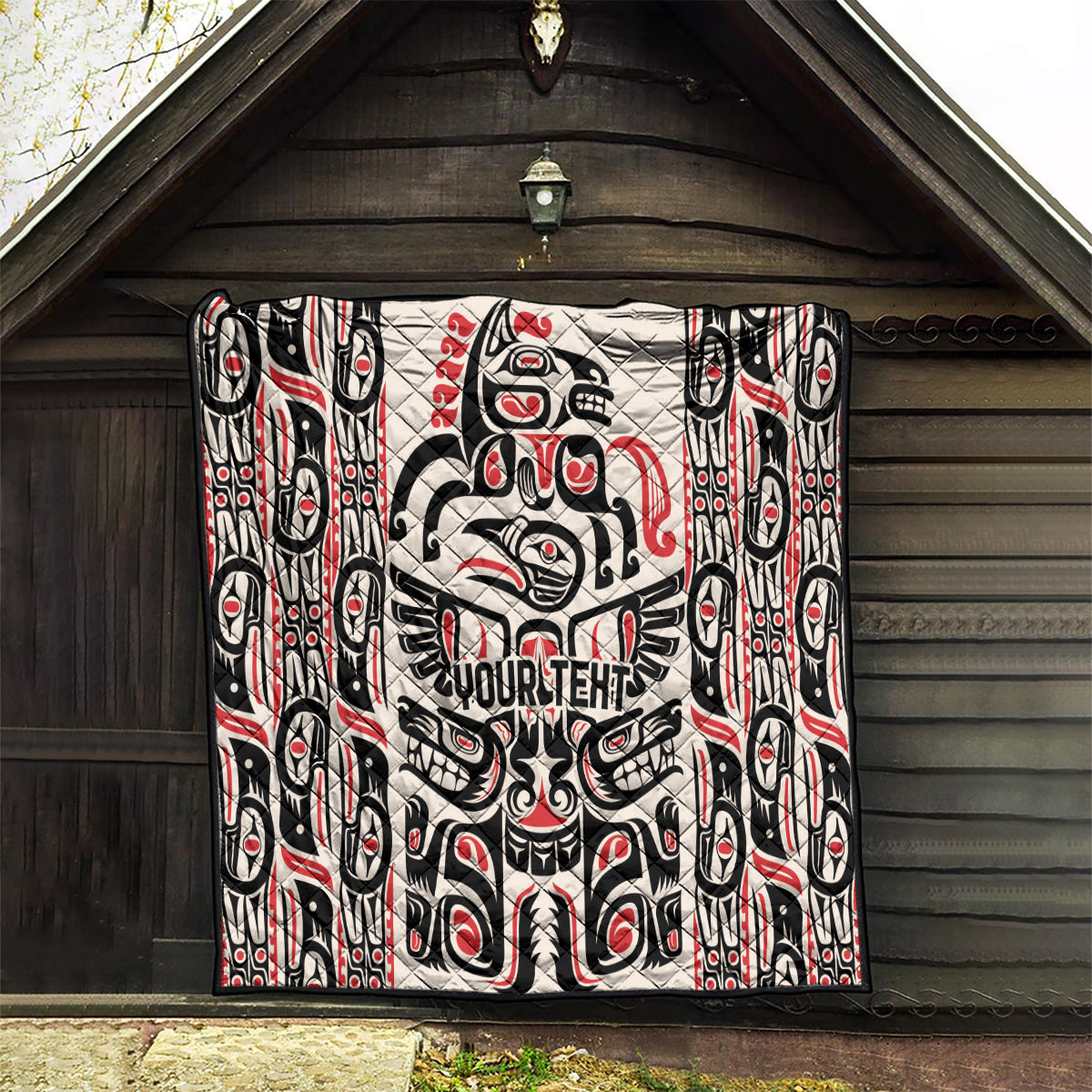 Personalized quilt with Haida raven and vertical pattern elements, black/white/red, YOUR TEXT