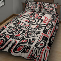 Quilt and two pillow shams with black, white, and red Haida-style totem pattern