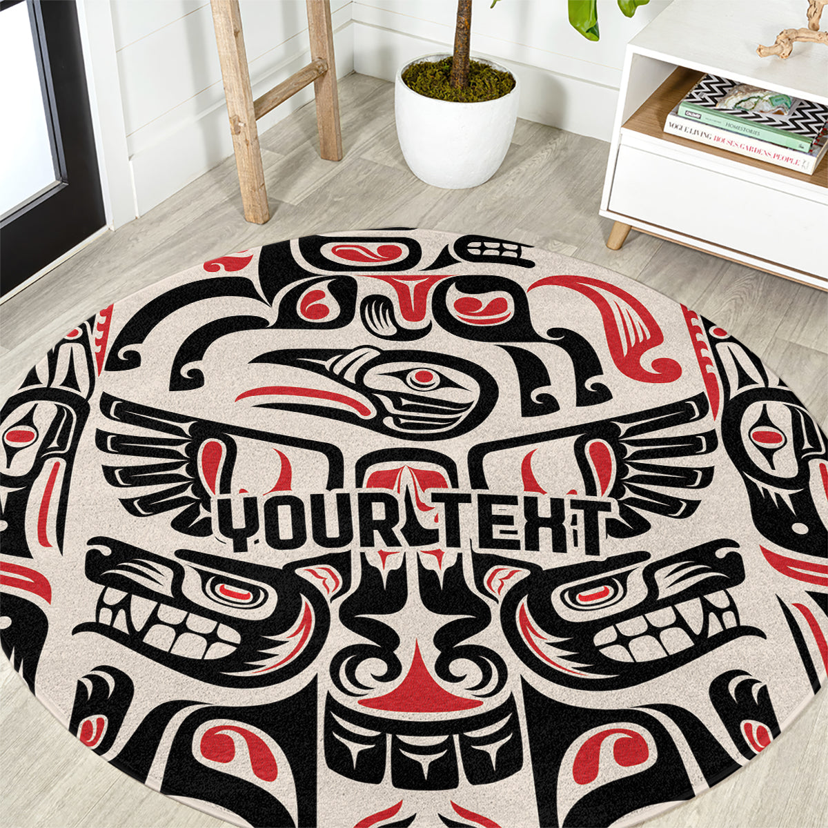 Round carpet close-up with black, cream, and red totem motif and 'YOURTEHT' lettering