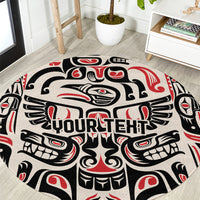 Round carpet close-up with black, cream, and red totem motif and 'YOURTEHT' lettering