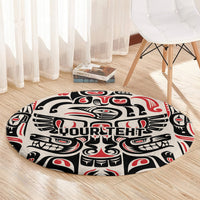 Round carpet with black, cream, and red totem motif and 'YOURTEHT' lettering