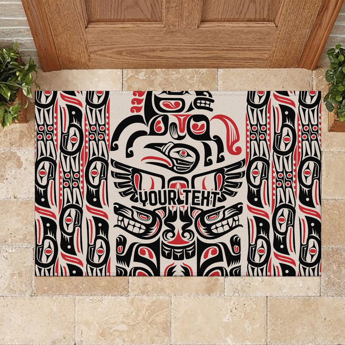 Personalized rubber doormat with Haida raven and totem pattern, black, red, and white.