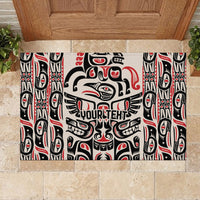 Personalized rubber doormat with Haida raven and totem pattern, black, red, and white.