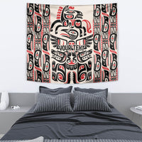 Haida-style tapestry with bold black, white, and red totem artwork and side motifs