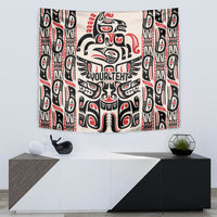 Haida-style tapestry featuring centered totem face, red swirl details, and eye motifs