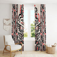 Pair of Haida-style window curtains in red, black, and white with tribal patterns