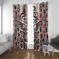 Haida-style window curtains with bold eagle motif in red, black, and white