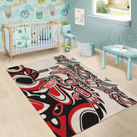 Rectangular area rug with red, black and cream pattern and “YOUR TEHT” text