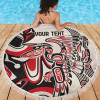 Round beach blanket with fringed edge, red black and white eagle design