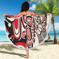 Round beach blanket with fringed edge, red black and white native-style eagle graphic
