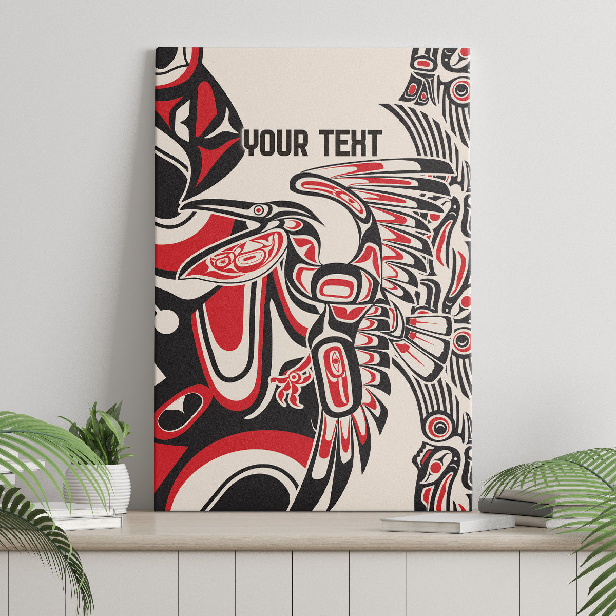 Personalized canvas wall art showing 'YOUR TEXT' and red/black/white tribal bird design
