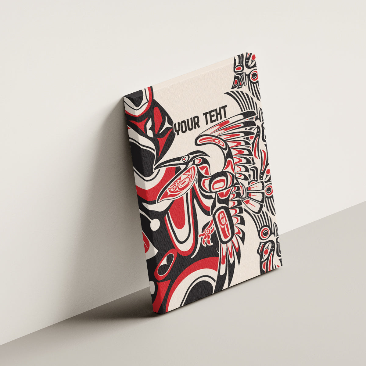 Personalized canvas wall art on angled wall, red/black/white tribal bird motif and 'YOUR TEXT'
