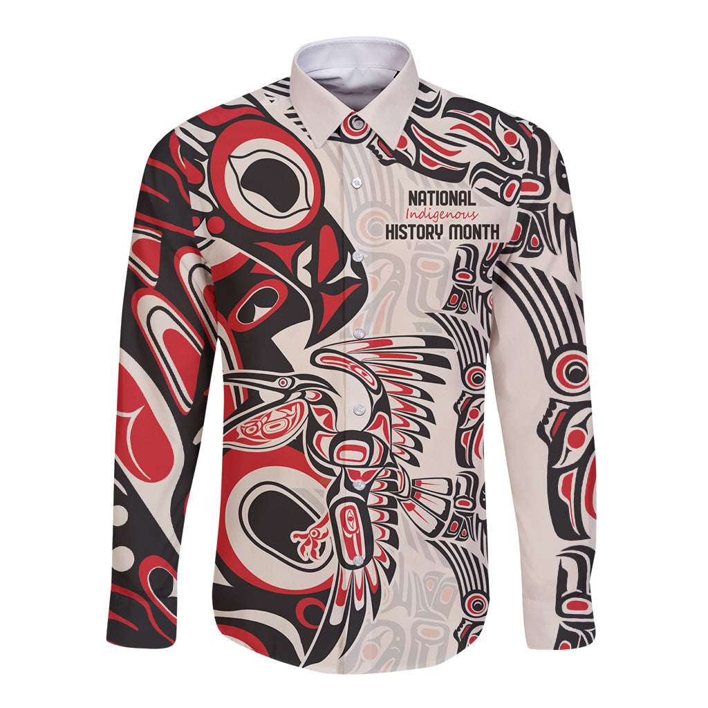 Red, black and cream long sleeve button-up shirt with front graphic badge