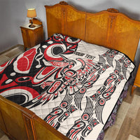 Personalized quilt in red, black, and white with “YOUR TEXT” and eagle and feather graphics