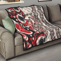Personalized quilt in red, black, and white with “YOUR TEXT” and tribal animal patterns
