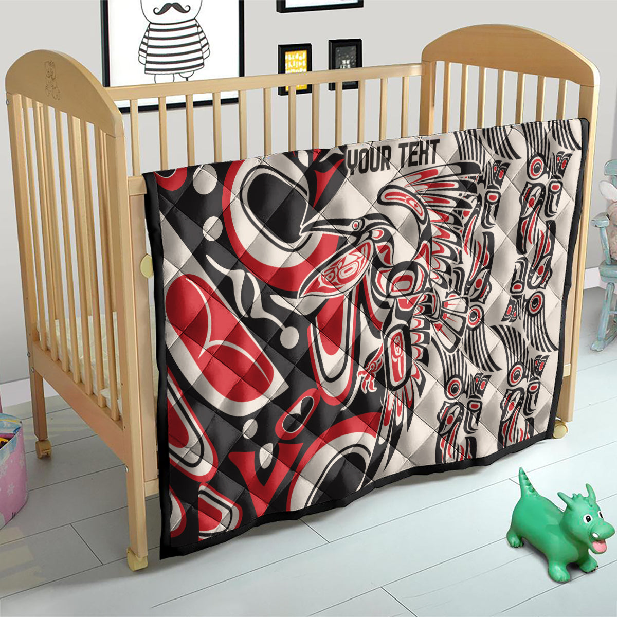 Personalized quilt in red, black, and white with “YOUR TEXT,” tribal bird and eye motifs