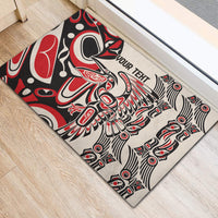 Personalized rubber doormat with red/black/white tribal artwork and centered 'YOUR TEXT'