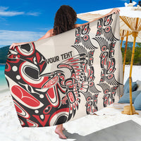 Tribal red-black-white sarong fabric close-up with 'YOUR TEXT' and graphic symbols