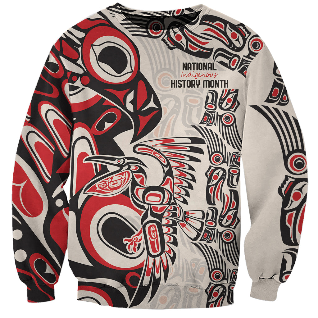 Unisex sweatshirt with red, black, and light gray Indigenous-style graphic, crew neck