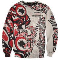 Unisex sweatshirt with red, black, and light gray Indigenous-style graphic, crew neck