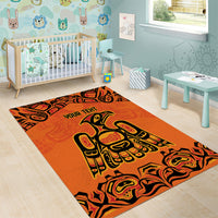Orange tribal pattern area rug with eagle motif and 'YOUR TEHI' center, indoor flooring