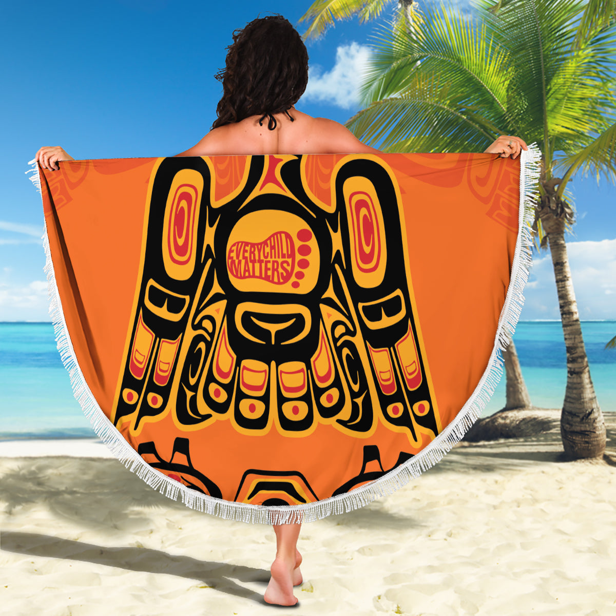 Orange circular beach blanket with tribal eagle design, 'YOUR TEXT' and white fringe border