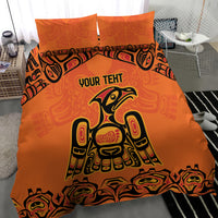 Orange duvet bedding set featuring large Haida-style animal graphic, with two pillowcases