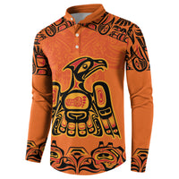 Orange button-front sweatshirt with large eagle graphic, tribal sleeve pattern, and emblem