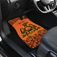 Orange rear car floor mat with Haida-style animal art and 'YOUR TEXT'
