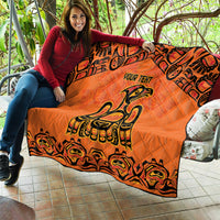 Orange quilt blanket with black border, Haida-style raven art and "YOUR TENT" text