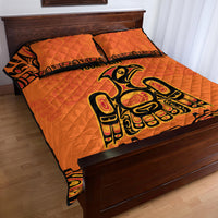Orange quilt bed set with two pillow shams, large black animal-style graphic
