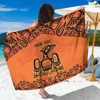 Orange sarong with large tribal pattern and 'YOUR TEHT' printed center