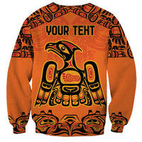Unisex orange sweatshirt with back 'YOUR TEXT' and totem bird graphic
