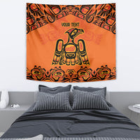Orange wall tapestry featuring black tribal border, 'YOUR TEXT', and central bird emblem.