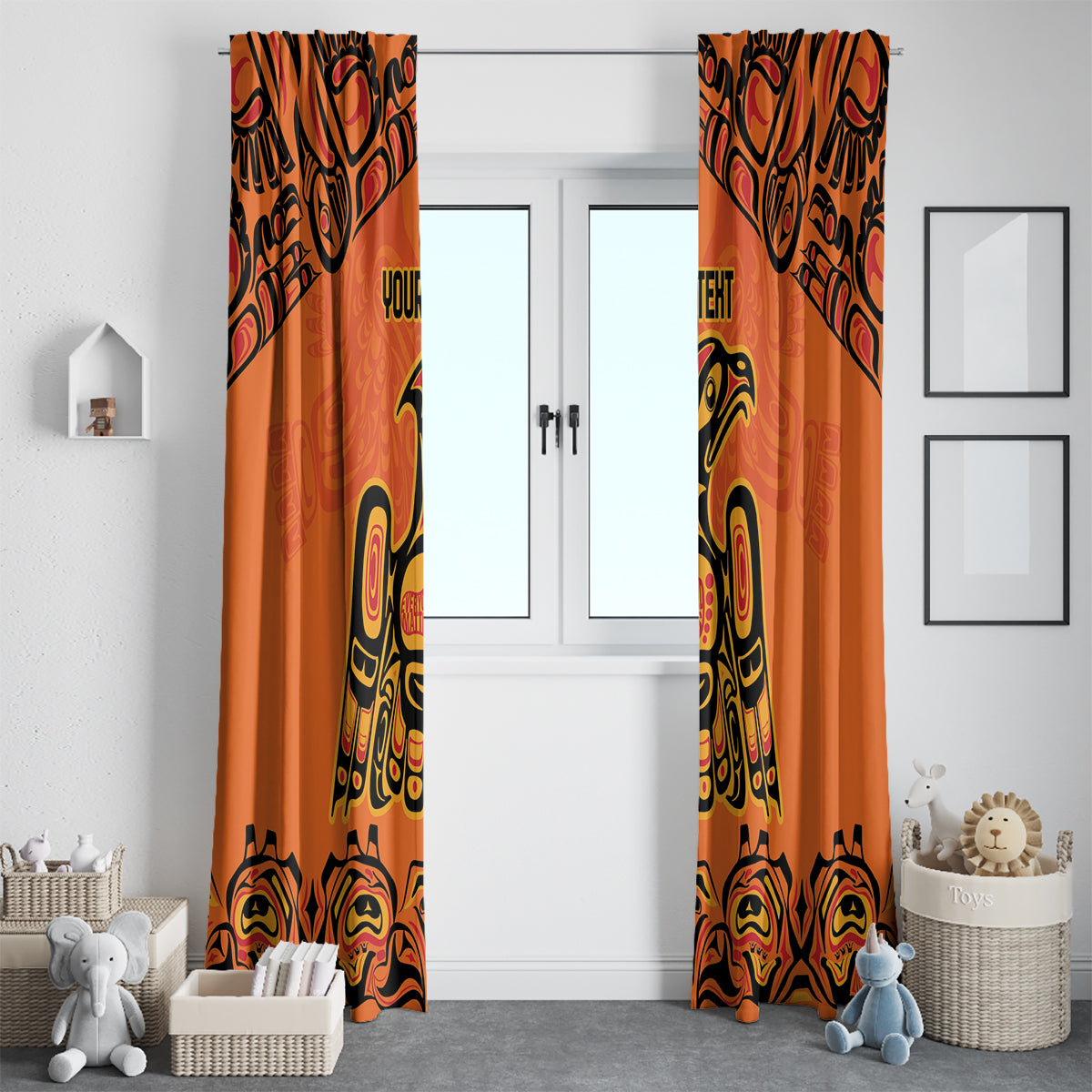 Orange curtain pair with black and yellow Indigenous totem artwork, hanging over window.