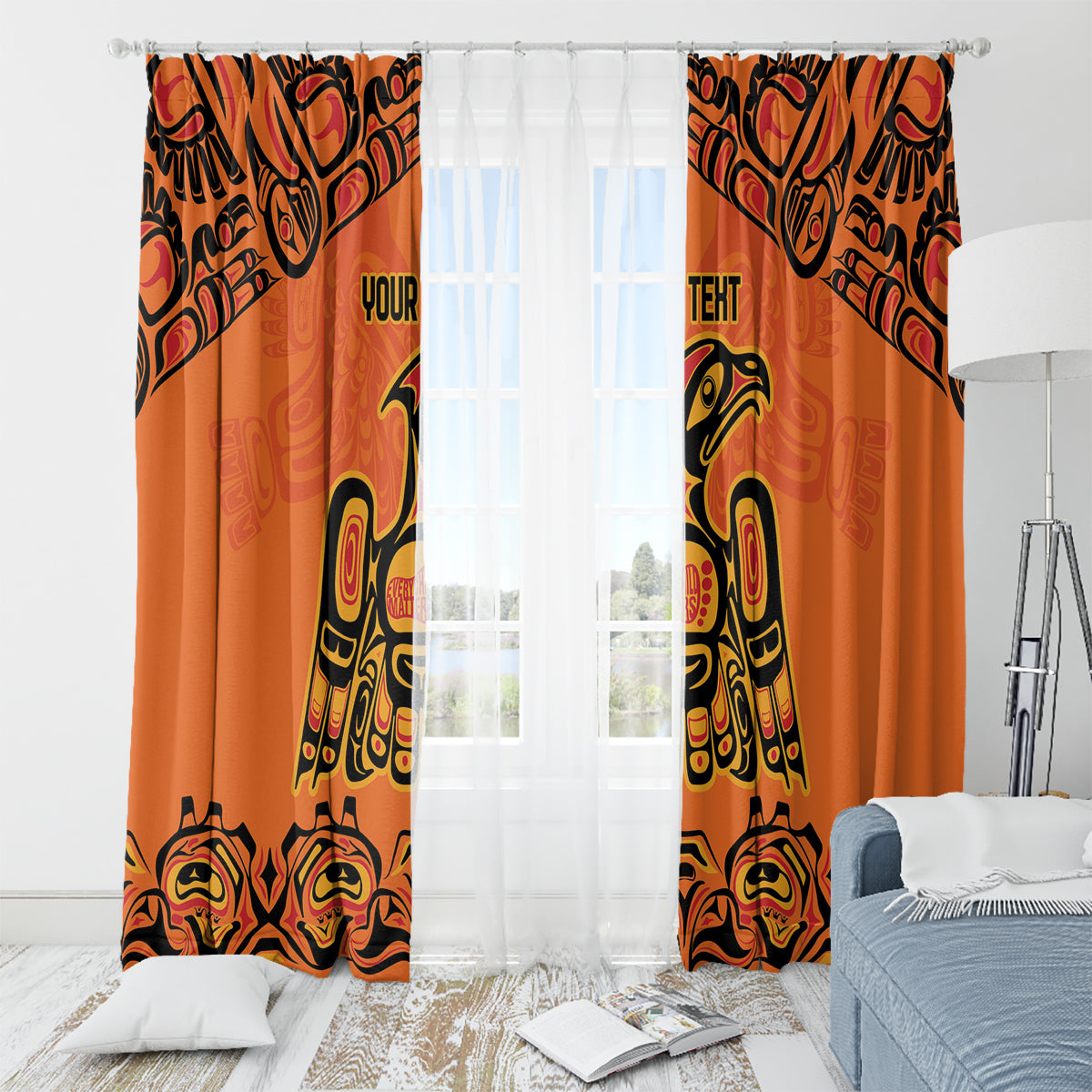 Orange window curtain panels with black and yellow totem artwork on rod with grommets.