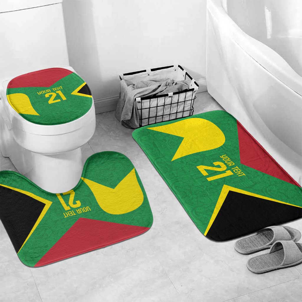 Green bath rug set with yellow number 21 design and toilet lid cover, stadium style