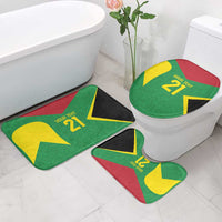 Green bath rugs with yellow 21 graphics and red/black trim, including toilet lid cover