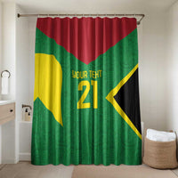 Green shower curtain with red top panel and yellow number 21 emblem