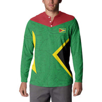 Green button-up sweatshirt with red collar, yellow/black zigzag graphic, emblem patch