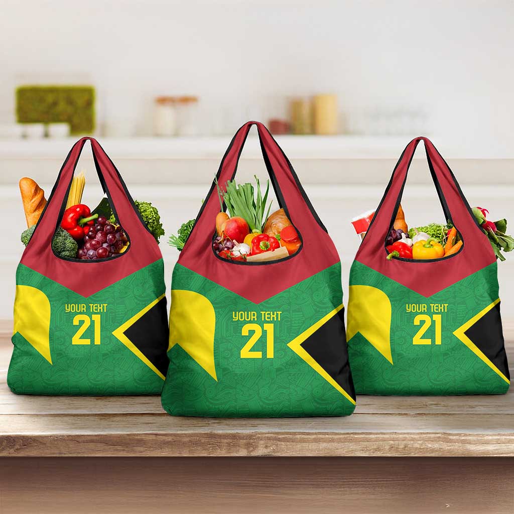 Set of three reusable grocery bags with green, red, yellow and black tent design