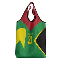 Reusable grocery bag in green, red, yellow and black with tent number 21 design