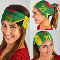 Green neck gaiter worn as headband and face cover with 'YOUR TENT 21' print